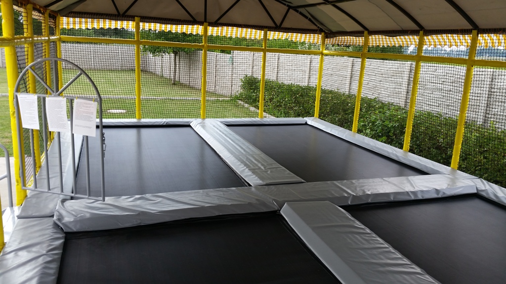Outdoor Trampoline Park with Various Games